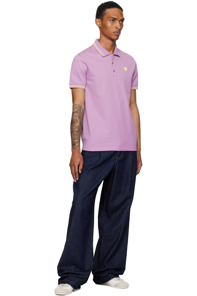 Cotton piqué polo.

· Stripes at rib-knit spread collar and cuffs
· Jacquard Greek key pattern at collar
· Three-button placket
· Embroidered logo at chest

Supplier color: Purple