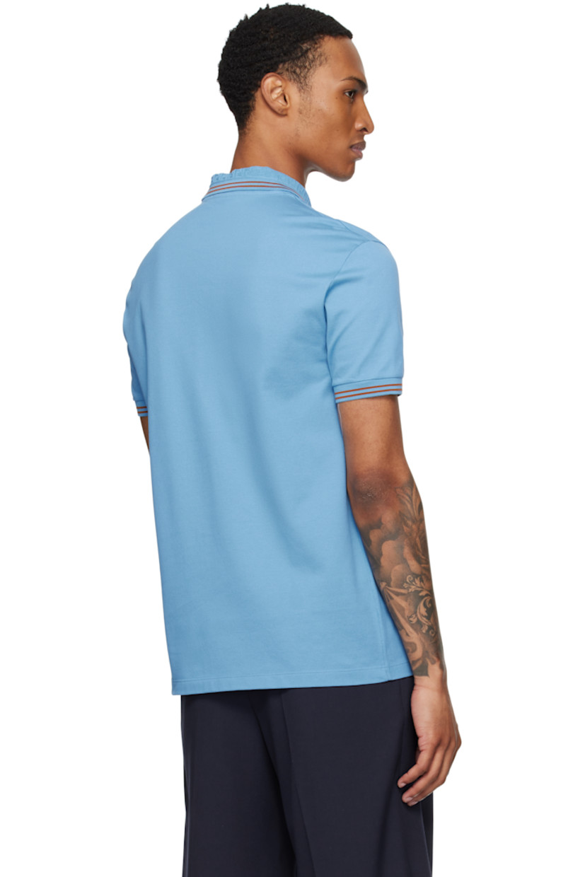 Cotton piqué polo.

· Stripes at rib-knit spread collar and cuffs
· Jacquard Greek key pattern at collar
· Three-button placket
· Embroidered logo at chest

Supplier color: Blue