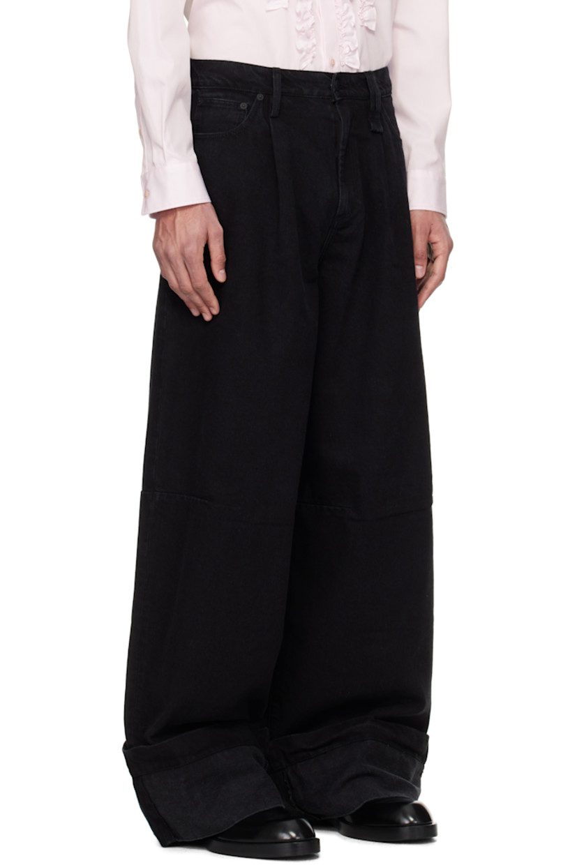 Wide-leg non-stretch denim jeans.

· Belt loops
· Five-pocket styling
· Zip fly
· Pleats at front
· Rolled cuffs
· Crystal-cut accents at hammer loop
· Logo patch at back waistband

Supplier color: Black/Jet