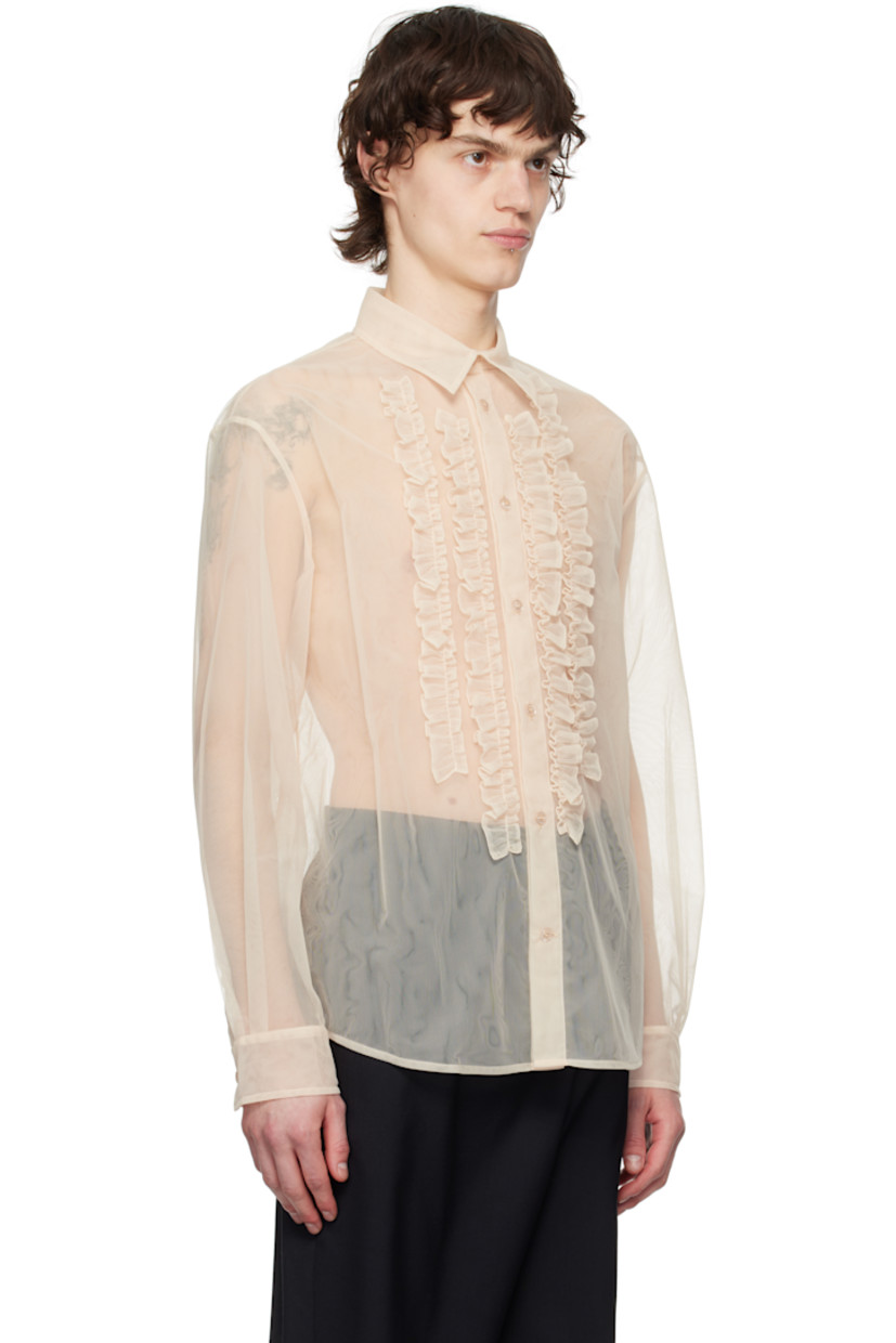 Sheer nylon tulle shirt.

· Spread collar
· Button closure
· Ruffles at front
· Shirttail hem
· Pleated single-button barrel cuffs
· Box pleat at back yoke

Supplier color: Pink
