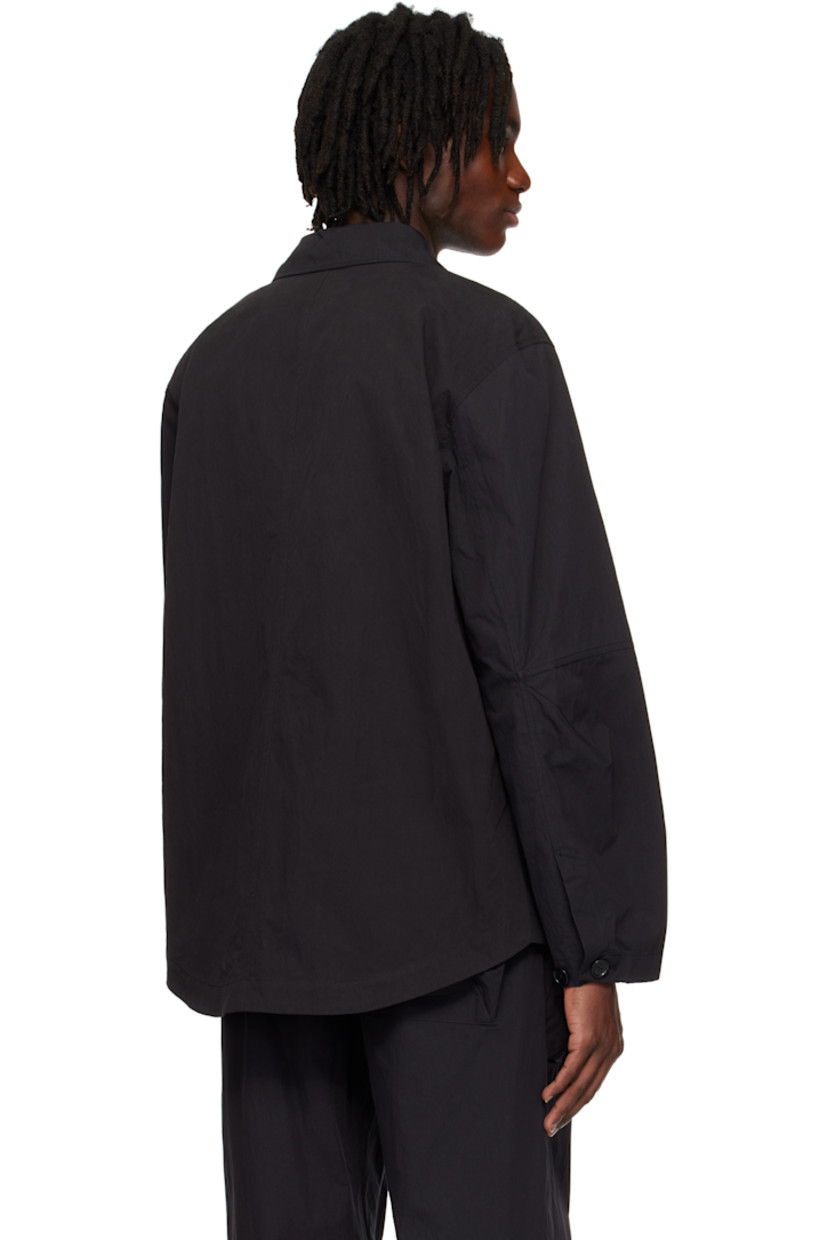 Waxed cotton-blend canvas blazer.

· Notched lapel
· Button closure
· Patch pockets and bow appliqués at front
· Shirttail hem
· Dart at elbows
· Adjustable button fastening at cuffs
· Logo-engraved hardware

Supplier color: Charcoal