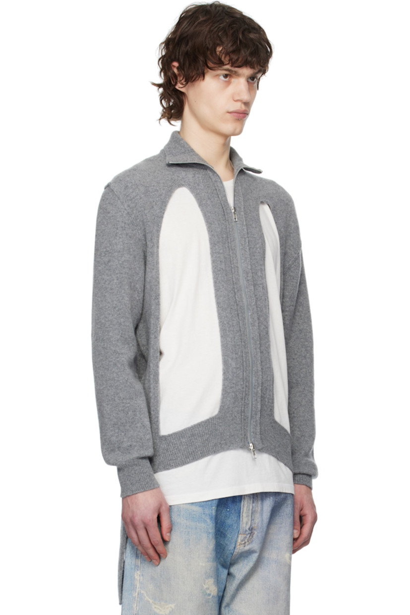 Knit stretch virgin wool-blend cardigan. 

· Rib-knit stand collar, hem, and cuffs
· Two-way zip closure
· Cutouts at front 
· Extended rib-knit trim at side seams

Supplier color: Pebble