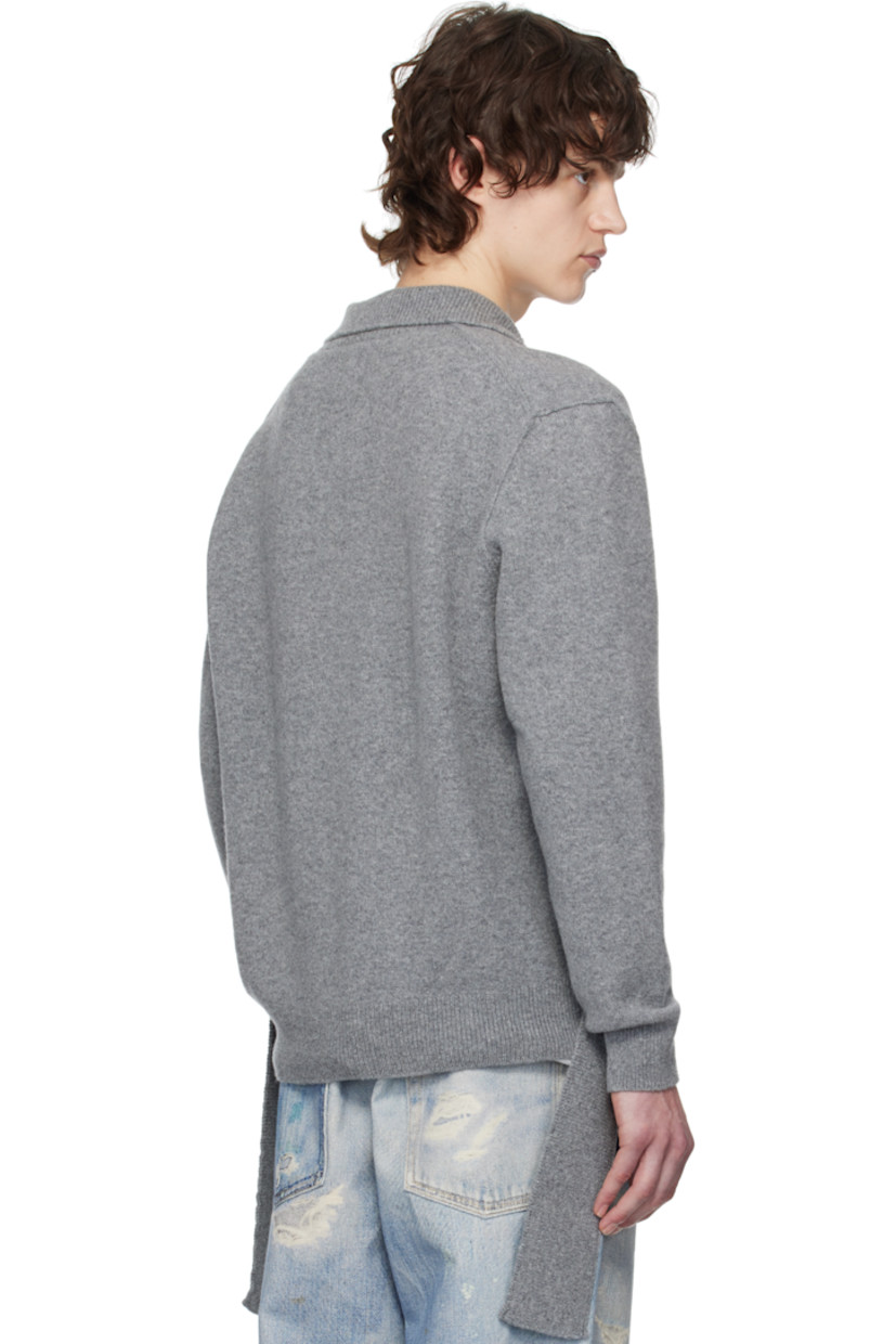 Knit stretch virgin wool-blend cardigan. 

· Rib-knit stand collar, hem, and cuffs
· Two-way zip closure
· Cutouts at front 
· Extended rib-knit trim at side seams

Supplier color: Pebble