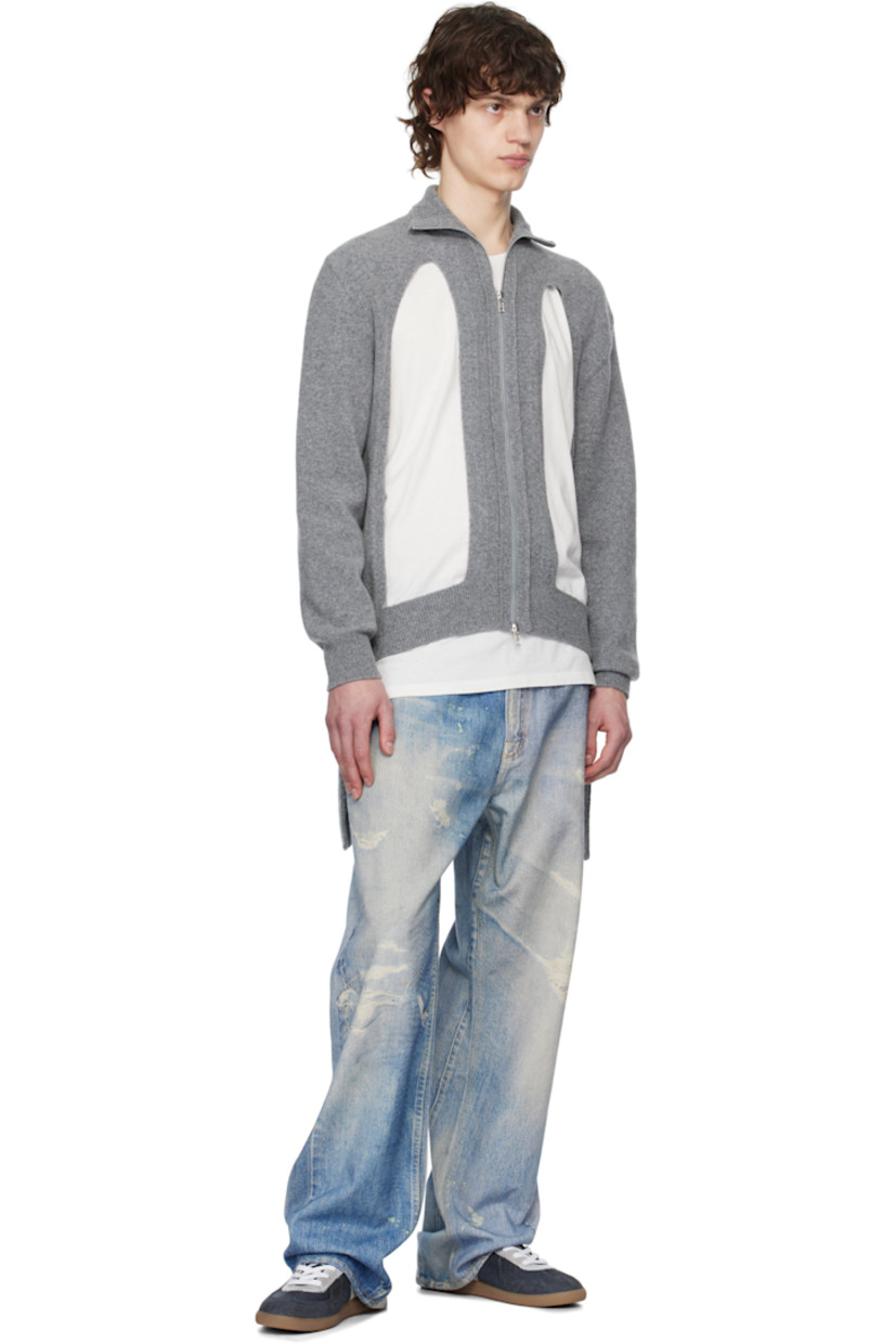 Knit stretch virgin wool-blend cardigan. 

· Rib-knit stand collar, hem, and cuffs
· Two-way zip closure
· Cutouts at front 
· Extended rib-knit trim at side seams

Supplier color: Pebble