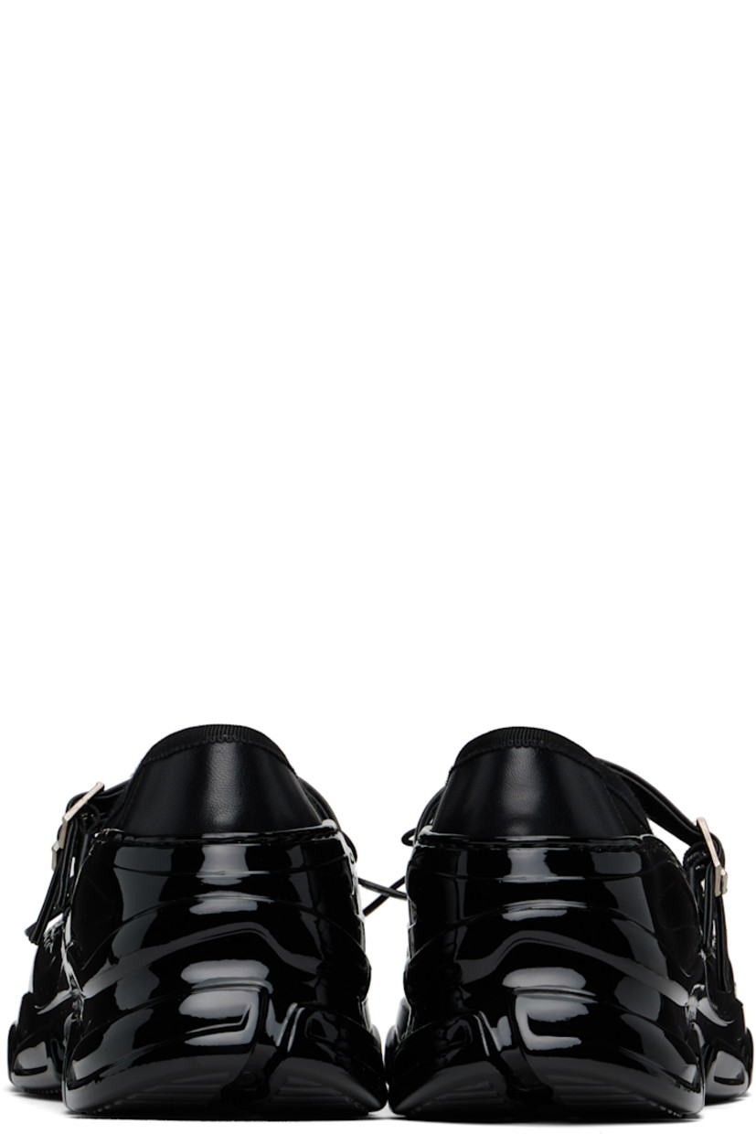Low-top mesh sneakers in black.

· Rubber cap toe
· Bow accent at vamp
· Buffed leather pin-buckle straps at vamp
· Grosgrain trim at collar
· Pull-loop at heel collar
· Rubber trim at welt 
· Padded leather footbed
· Mesh lining
· Treaded rubber sole

Supplier color: Black