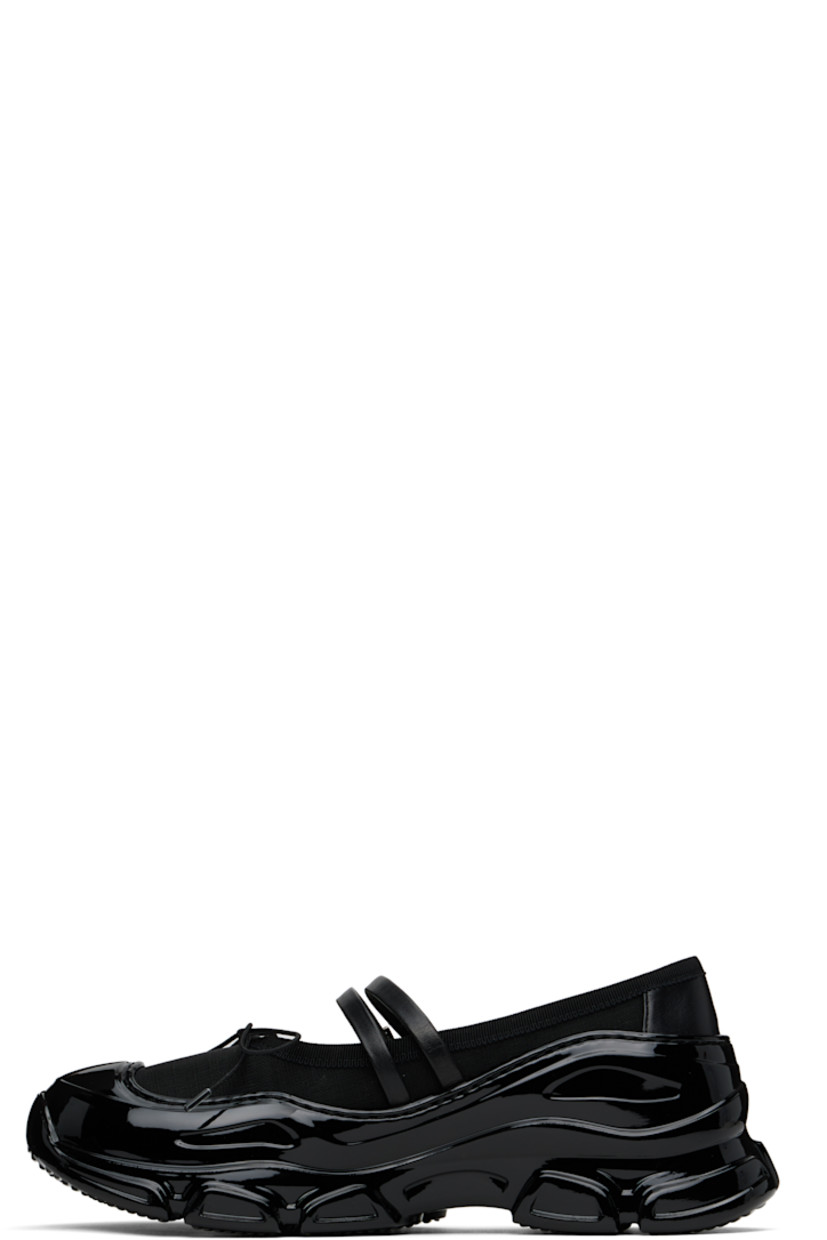 Low-top mesh sneakers in black.

· Rubber cap toe
· Bow accent at vamp
· Buffed leather pin-buckle straps at vamp
· Grosgrain trim at collar
· Pull-loop at heel collar
· Rubber trim at welt 
· Padded leather footbed
· Mesh lining
· Treaded rubber sole

Supplier color: Black