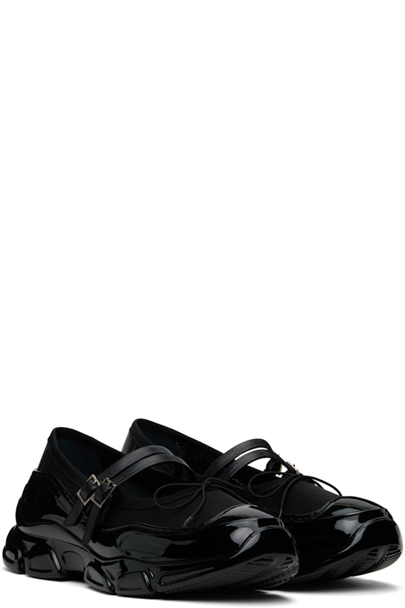 Low-top mesh sneakers in black.

· Rubber cap toe
· Bow accent at vamp
· Buffed leather pin-buckle straps at vamp
· Grosgrain trim at collar
· Pull-loop at heel collar
· Rubber trim at welt 
· Padded leather footbed
· Mesh lining
· Treaded rubber sole

Supplier color: Black