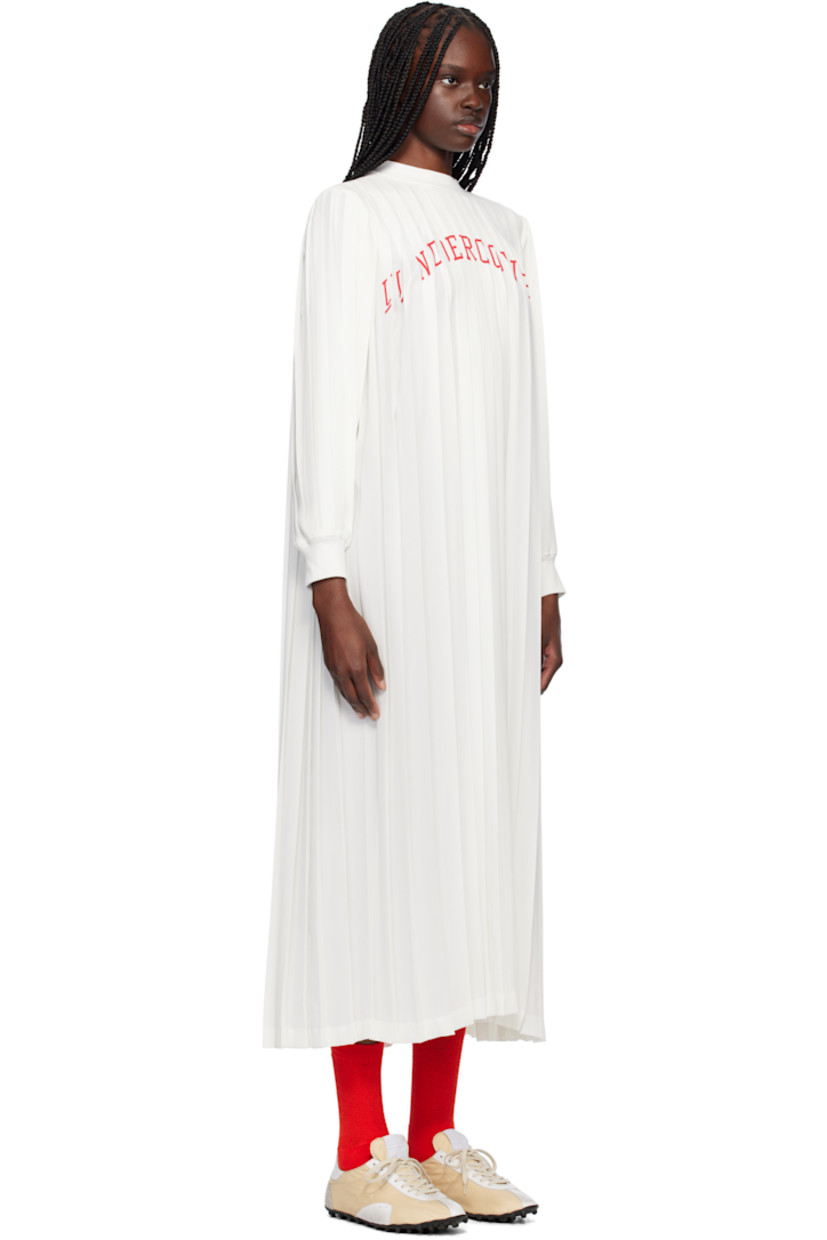 Polyester crêpe maxi dress. Pleats throughout.

· Rib-knit crewneck and cuffs
· Logo printed at chest
· Button fastening at back collar

Supplier color: White