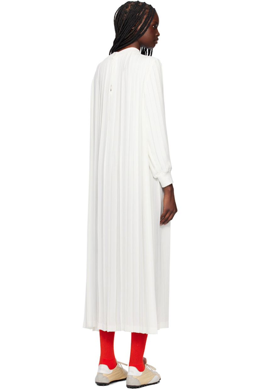 Polyester crêpe maxi dress. Pleats throughout.

· Rib-knit crewneck and cuffs
· Logo printed at chest
· Button fastening at back collar

Supplier color: White