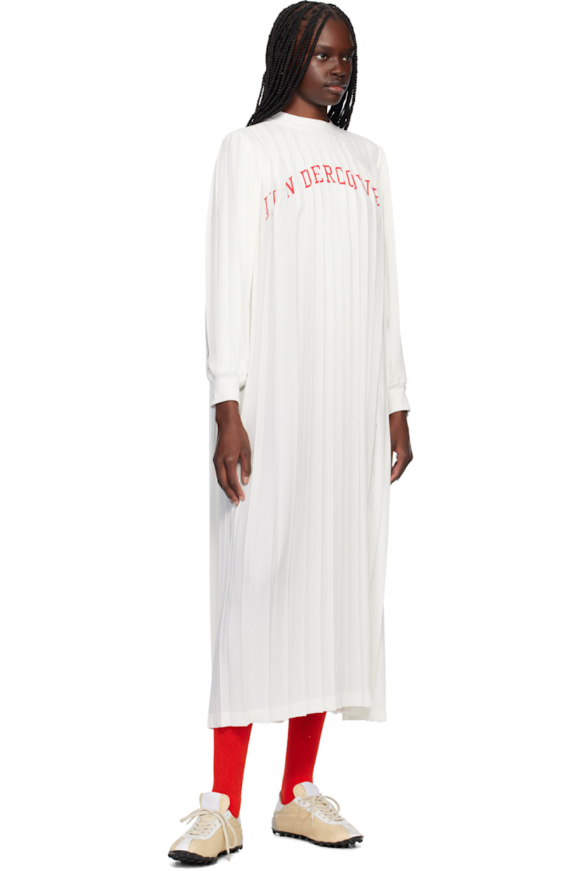 Polyester crêpe maxi dress. Pleats throughout.

· Rib-knit crewneck and cuffs
· Logo printed at chest
· Button fastening at back collar

Supplier color: White