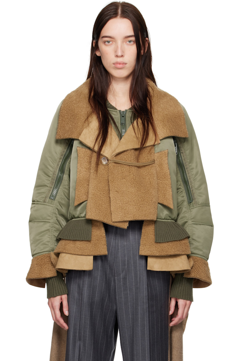 Insulated nylon taffeta bomber jacket. Faux-shearling trim throughout.

· Layered and paneled construction
· Spread collar
· Button placket
· Rib-knit stand collar, hem, and cuffs
· Zip closure
· Welt pockets at front
· Zip pocket at sleeves
· Partial satin lining

Supplier color: Khaki