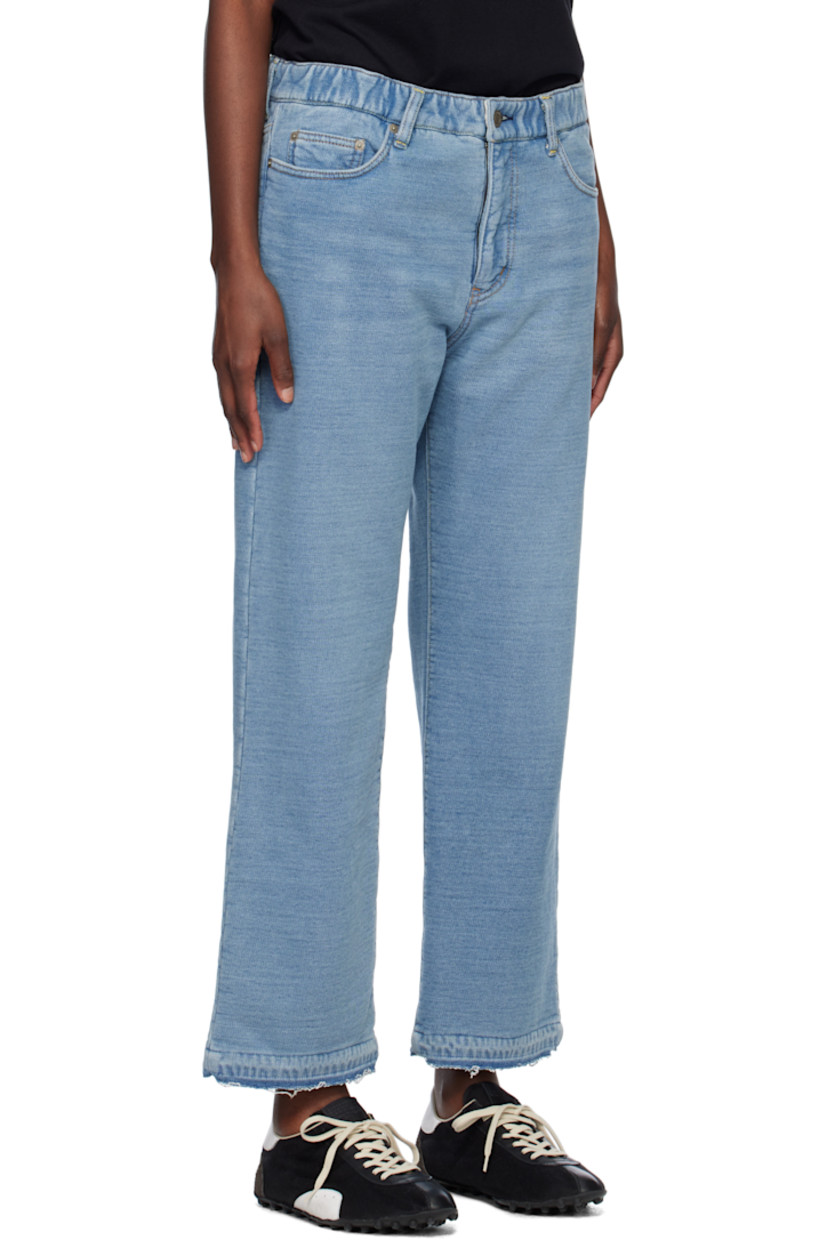 French terry sweatpants. Trompe l'œil denim pattern printed throughout.

· Concealed drawstring at elasticized waistband
· Belt loops
· Five-pocket styling
· Frayed edge at cuffs
· Logo flag at back pocket
· Contrast stitching in tan

Supplier color: Light blue indigo