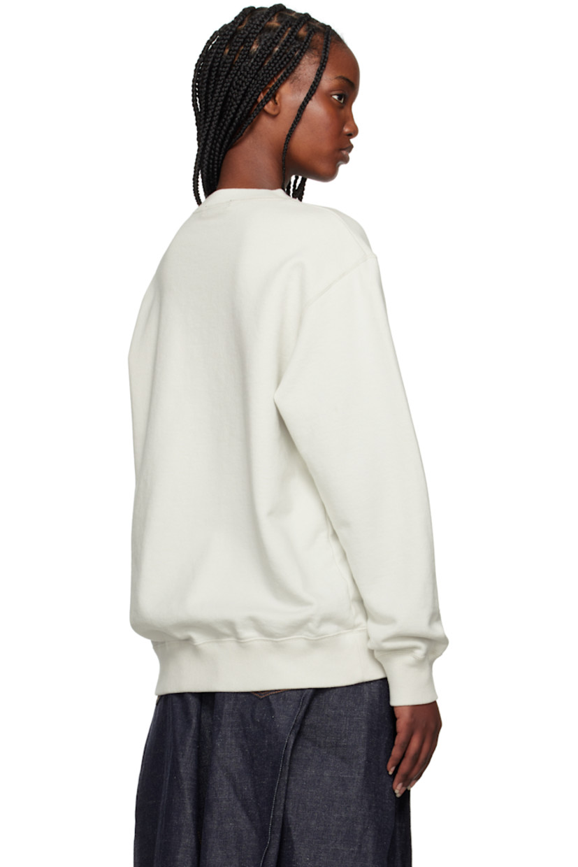 French terry sweatshirt.

· Rib-knit crewneck, hem, and cuffs
· Text embroidered at printed at front
· Beaded floral appliqué at front

Supplier color: Ice gray