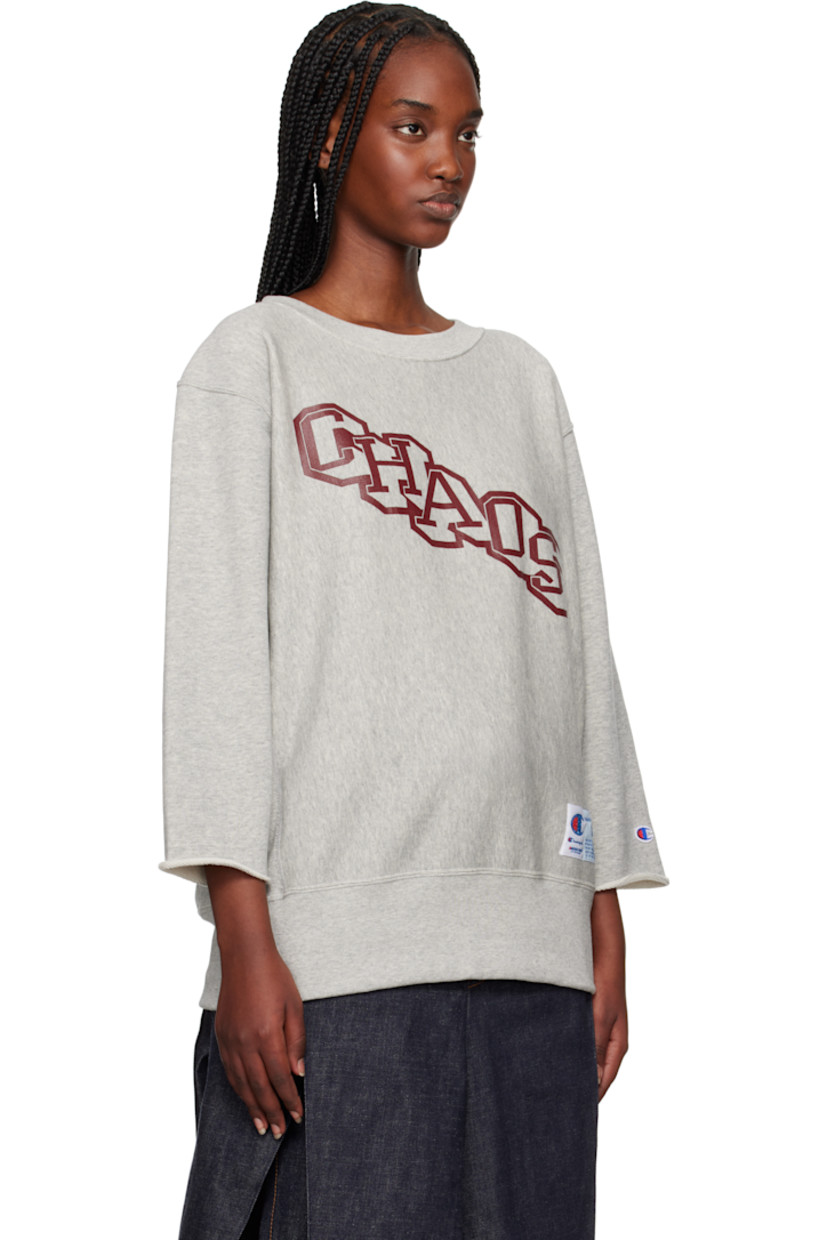 French terry sweatshirt.

· Rib-knit crewneck and hem 
· Text printed at front
· Logo patch at hem 
· Dropped shoulders
· Embroidered logo patch at cuff
· Rolled edge at cuffs

Part of the UNDERCOVER x Champion collaboration.

Supplier color: Top gray