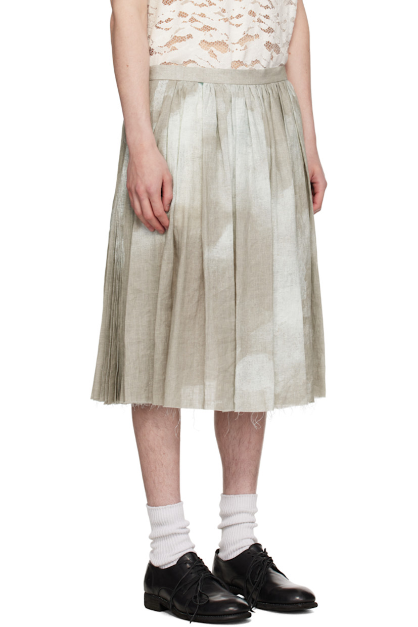 Linen hopsack skirt. Pleats and printed graphic pattern throughout.

· Two-pocket styling
· Raw edge at hem
· Zip closure at side seam

Supplier color: Natural base