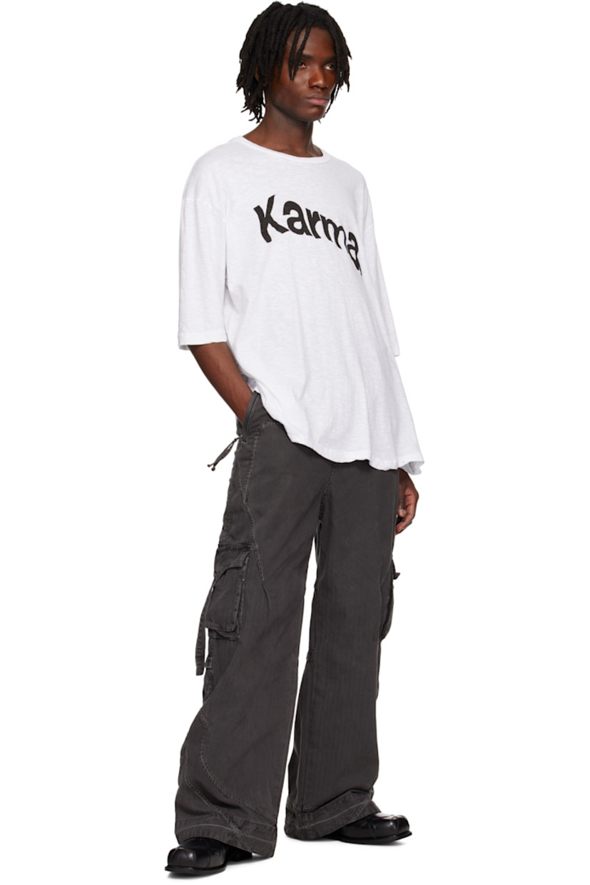 Cotton jersey T-shirt.

· Rib-knit crewneck
· Text printed at front
· Asymmetric hem
· Dropped shoulders

Supplier color: White