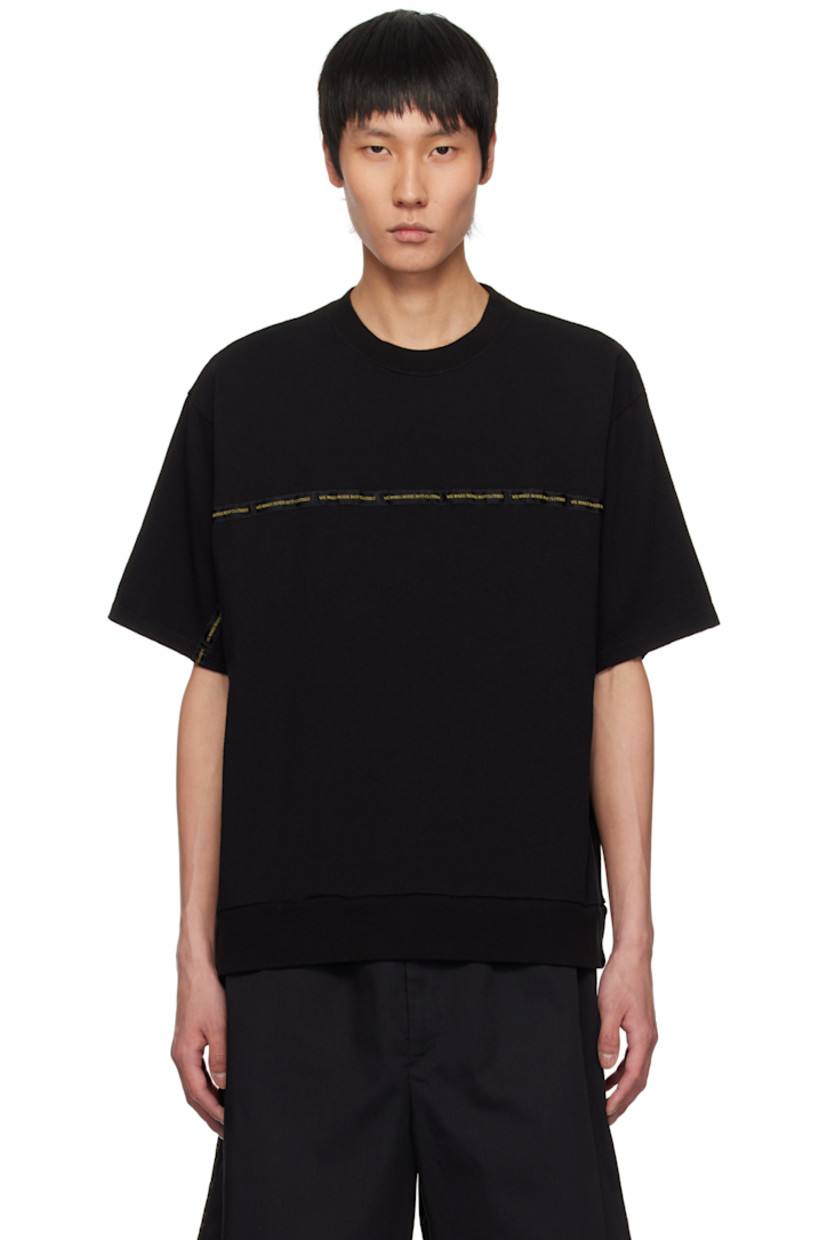 Cotton jersey T-shirt.

· Rib-knit crewneck
· Text-woven trim at chest and sleeves
· Dropped shoulders

Supplier color: Black