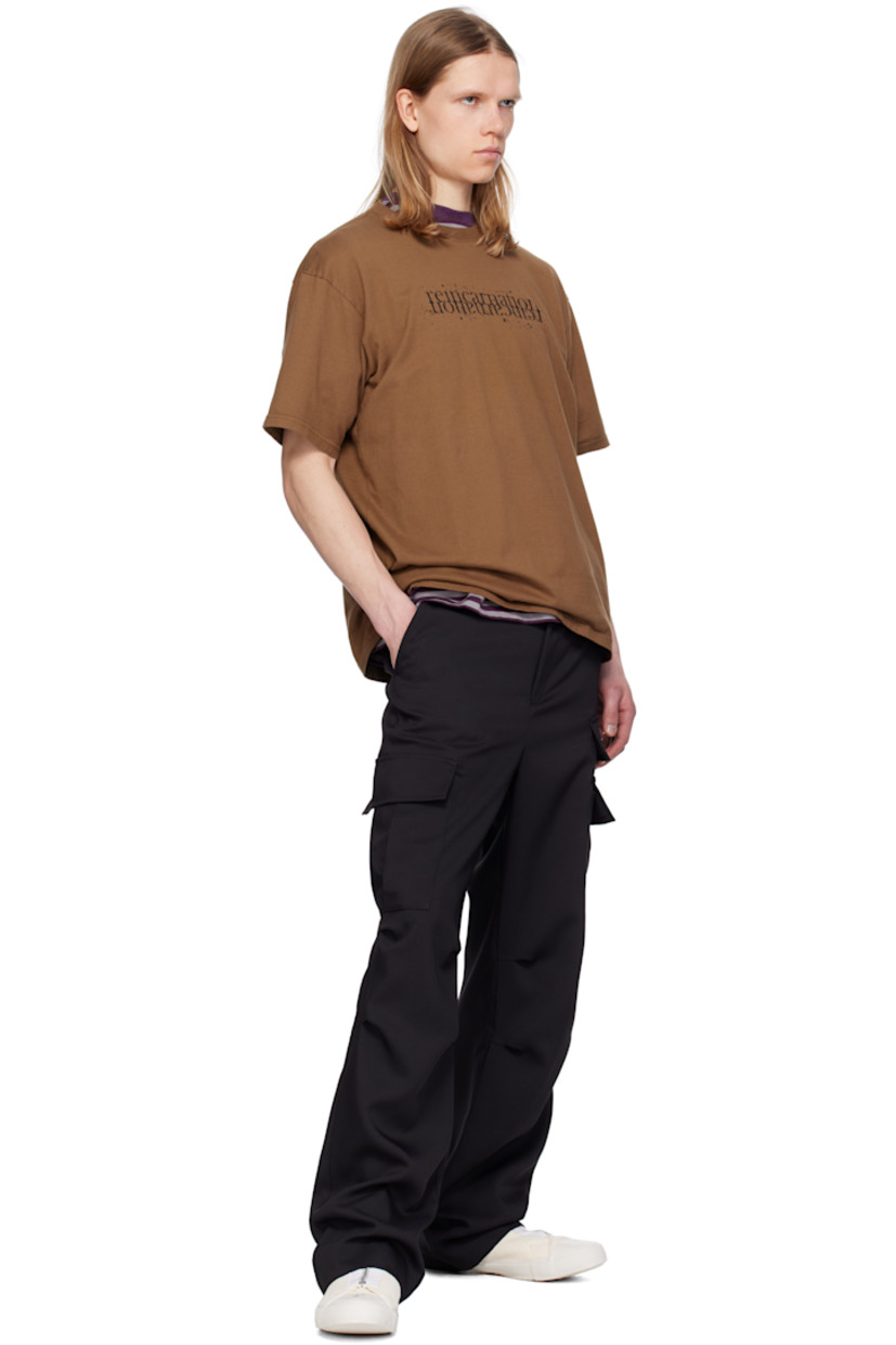 Cotton jersey T-shirt. 

· Rib-knit crewneck
· Text printed at chest
· Dropped shoulders
· Graphic printed at back

Supplier color: Brown