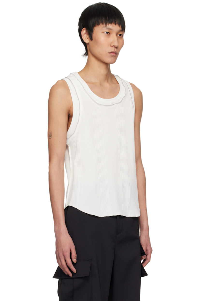 Rib-knit cotton tank top. Zipper detailing throughout.

· Crewneck
· Raw edge at curved hem

Supplier color: White