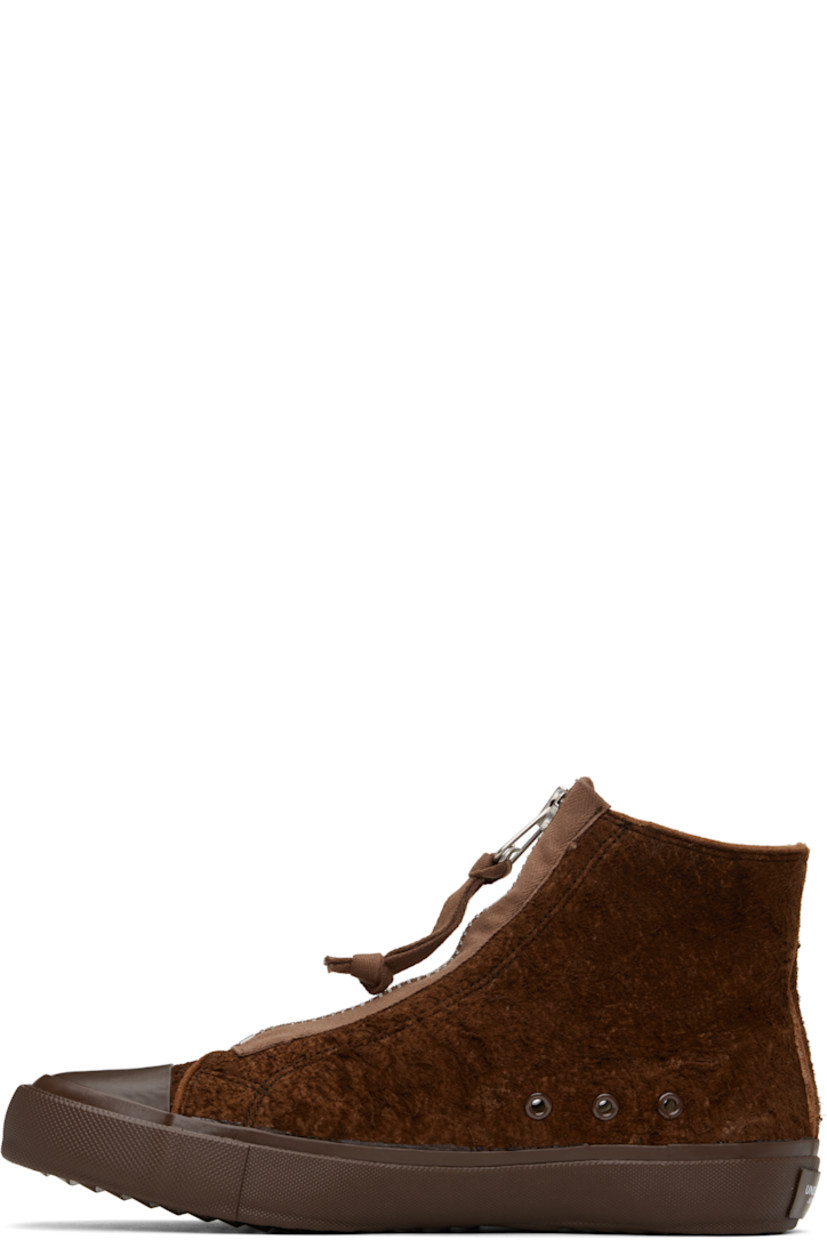 High-top brushed deerskin suede sneakers in brown.

· Graphic printed at rubber cap toe 
· Zip closure at vamp
· Grommets at sides
· Canvas lining 
· Logo patch at heel
· Textured rubber midsole 
· Treaded rubber sole 

Supplier color: Brown