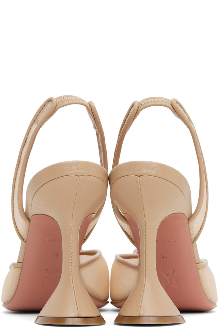 Sheer mesh heels in beige.

· Pointed toe
· Hardware with crystal-cut accents at vamp
· Partially elasticized slingback strap
· Logo-embossed goatskin footbed
· Covered spool heel with rubber injection
· Polished leather sole with rubber injections
· Heel: H3.75"

Supplier color: Beige mesh