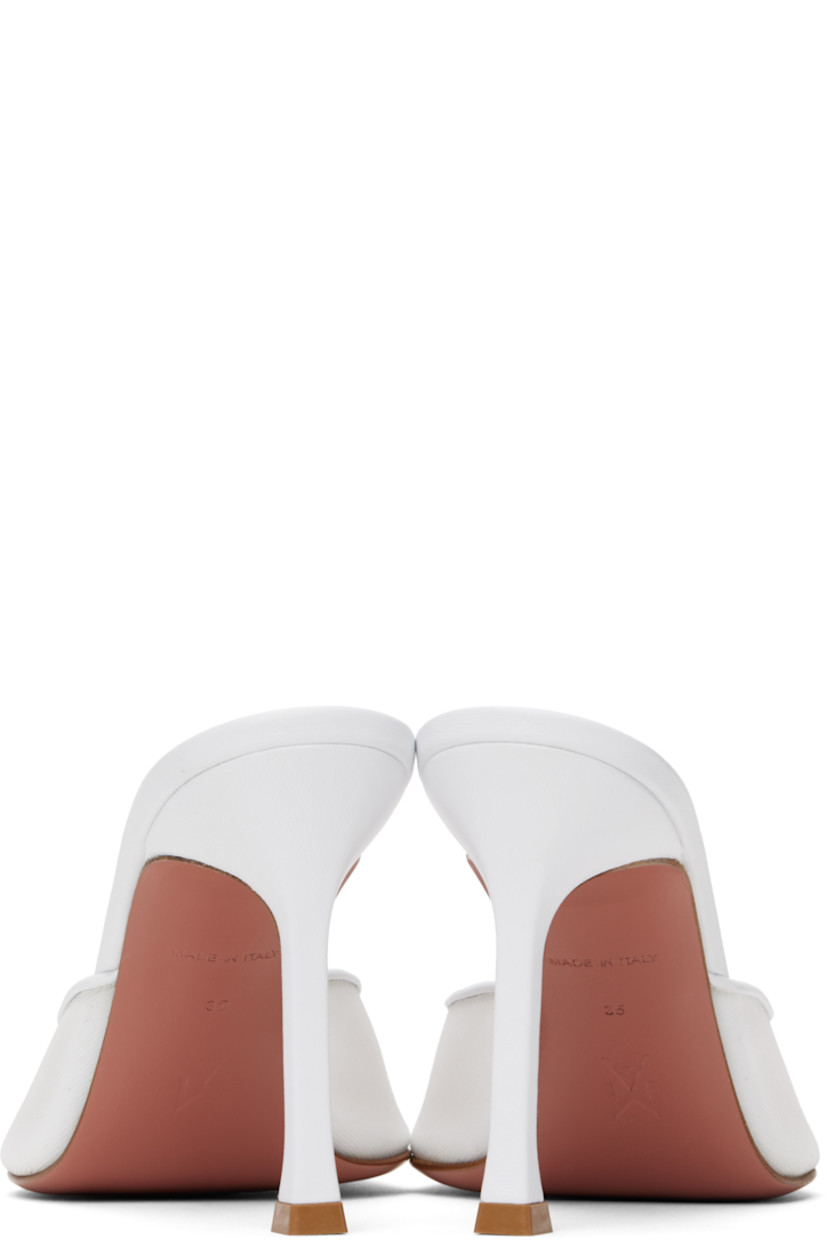 Semi-sheer mesh heeled sandals in white.

· Open pointed square toe
· Logo-embossed padded goatskin footbed
· Leather stiletto heel with rubber injection
· Polished leather sole with rubber injection
· Heel: H3.75"

Supplier color: White mesh