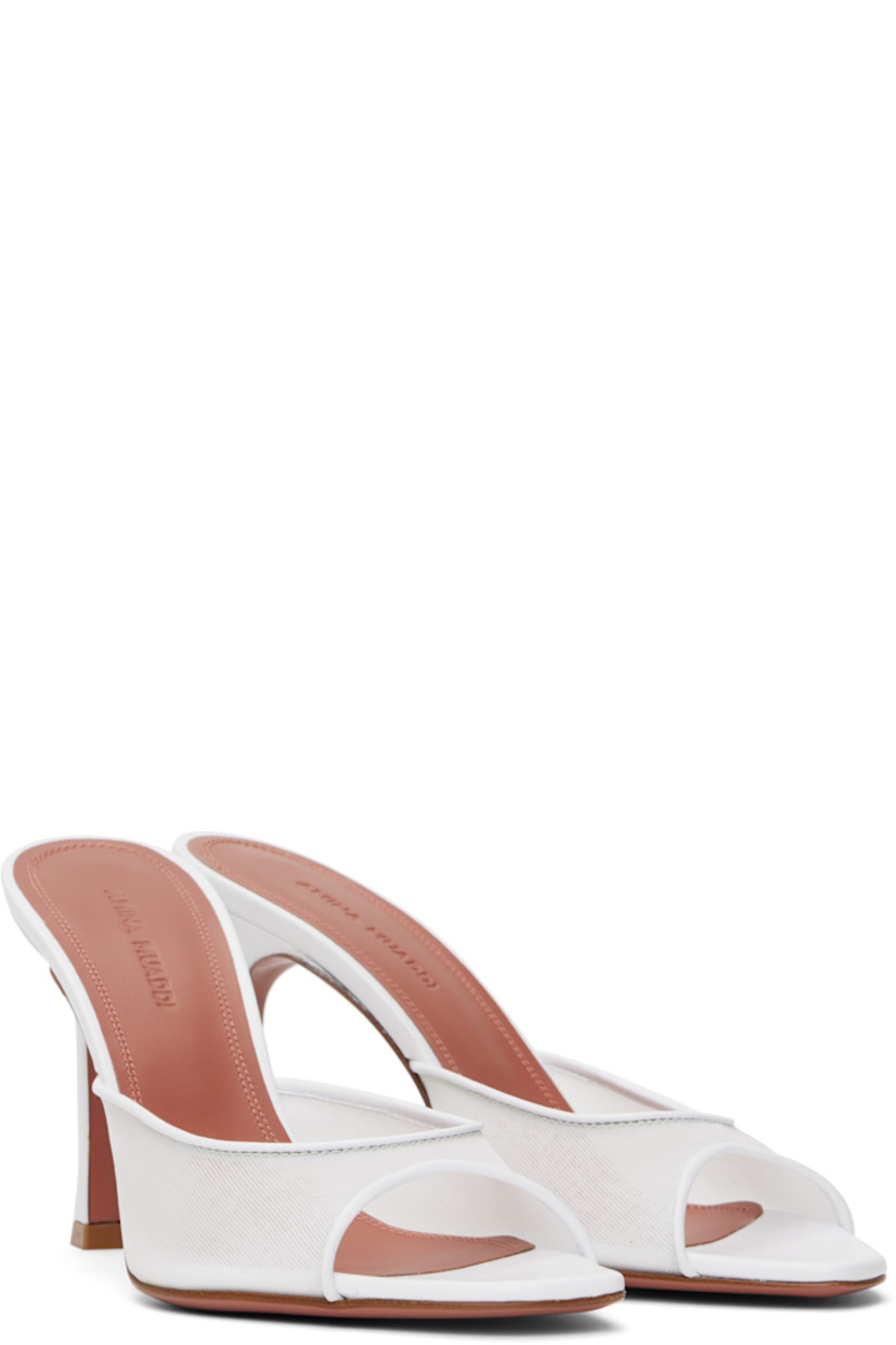 Semi-sheer mesh heeled sandals in white.

· Open pointed square toe
· Logo-embossed padded goatskin footbed
· Leather stiletto heel with rubber injection
· Polished leather sole with rubber injection
· Heel: H3.75"

Supplier color: White mesh