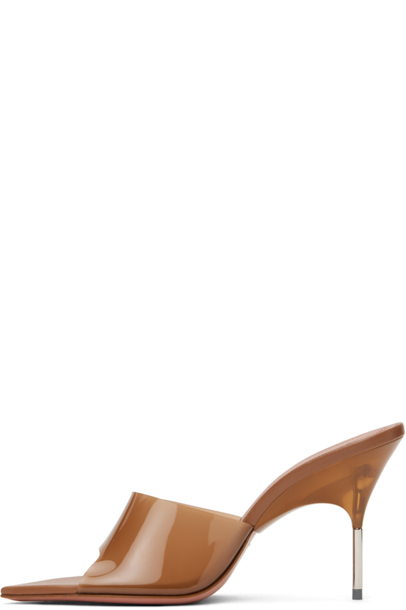 Semi-transparent vinyl mules in beige.

· Open pointed toe
· Strap at vamp
· Buffed leather footbed
· Stiletto heel with rubber injection
· Smooth leather sole with rubber injection
· Heel: H3.25"

Supplier color: Latte PVC/Shiny silver