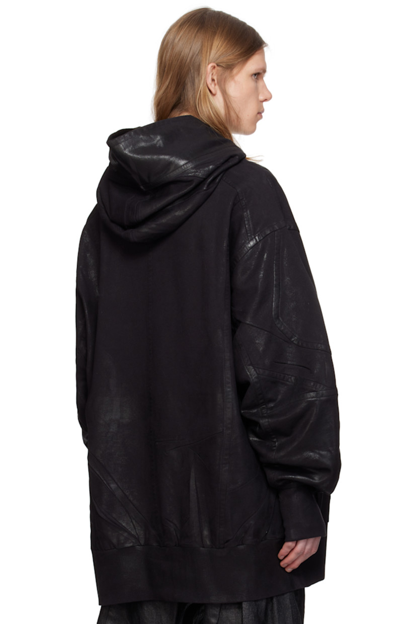 Oversized coated French terry hoodie.

· Paneled construction
· Patch pockets
· Rib-knit hem and cuffs
· Dropped shoulders
· Thumbhole at cuffs

Supplier color: Black