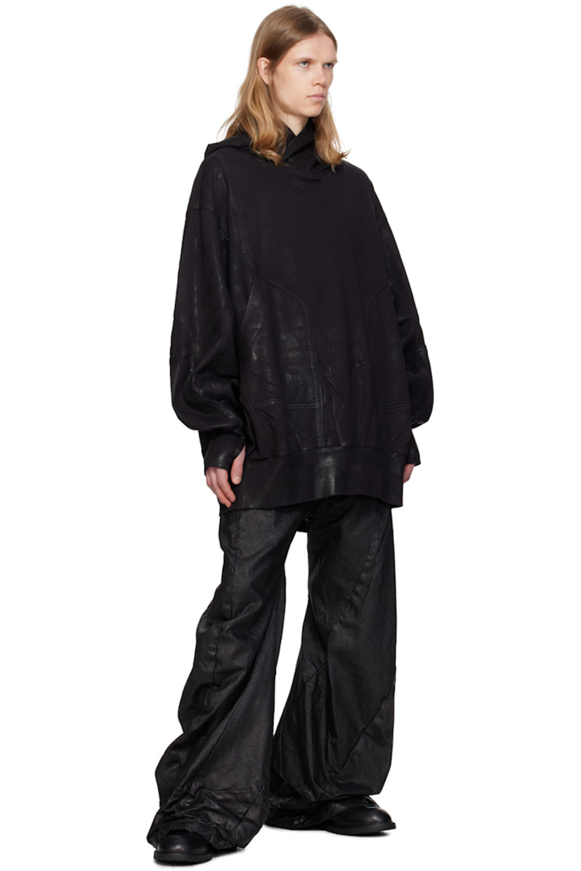 Oversized coated French terry hoodie.

· Paneled construction
· Patch pockets
· Rib-knit hem and cuffs
· Dropped shoulders
· Thumbhole at cuffs

Supplier color: Black