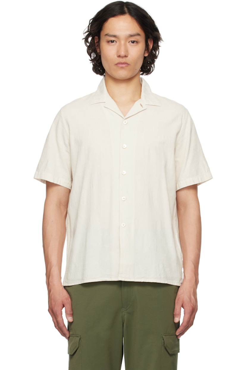 Cotton gauze shirt. Jacquard check pattern throughout.

· Open spread collar
· Button closure
· Logo flag at side seam
· Tennis-tail hem
· Dropped shoulders
· Mother-of-pearl hardware

Supplier color: White