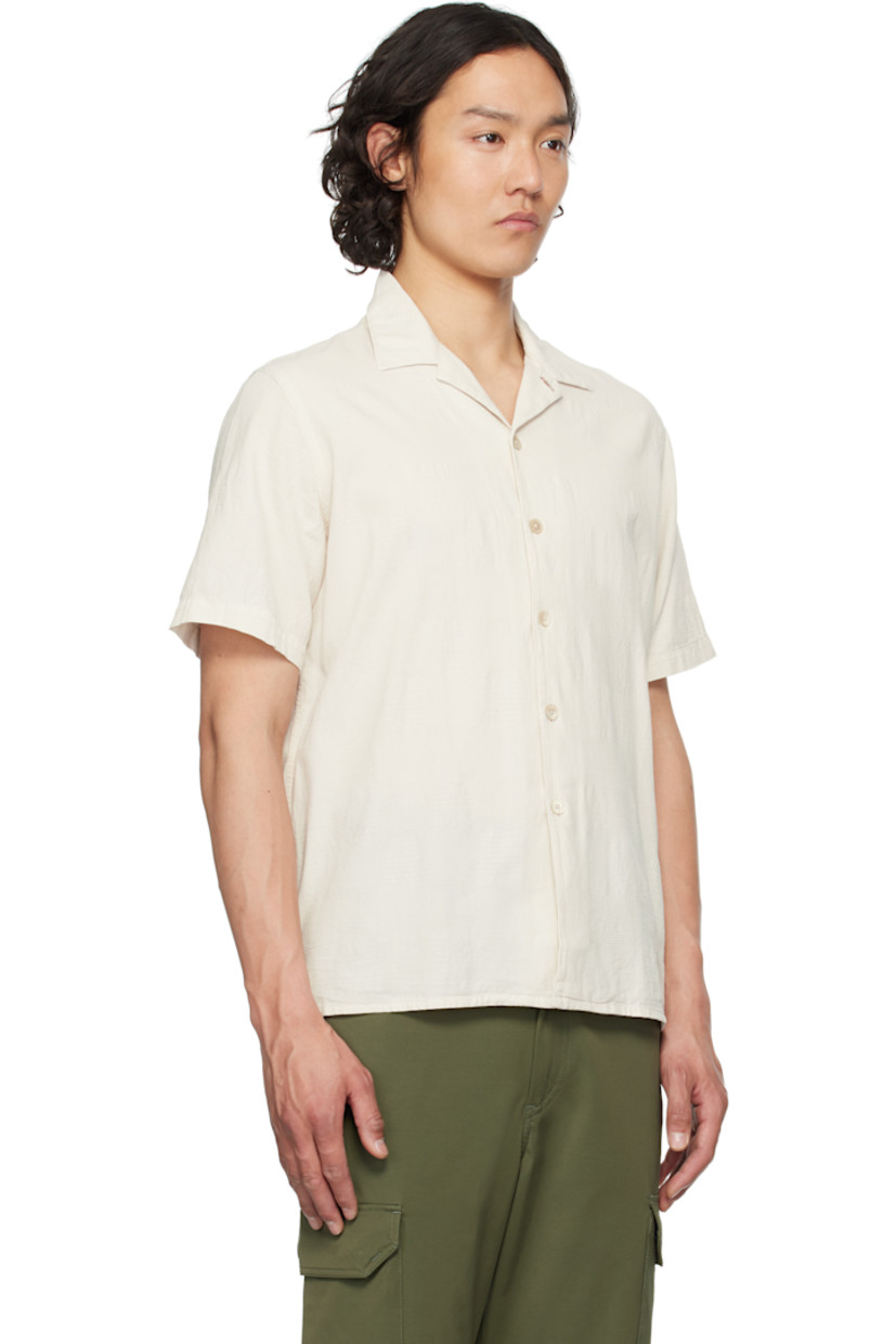 Cotton gauze shirt. Jacquard check pattern throughout.

· Open spread collar
· Button closure
· Logo flag at side seam
· Tennis-tail hem
· Dropped shoulders
· Mother-of-pearl hardware

Supplier color: White