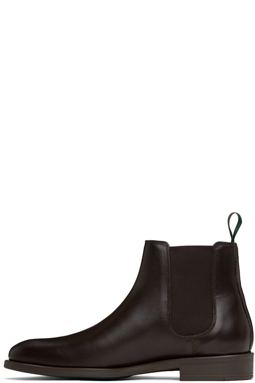 Ankle-high polished leather Chelsea boots in brown.

· Elasticized gusset at sides
· Logo-woven pull-loop at heel collar
· Logo flag at outer side
· Buffed leather lining
· Stacked rubber heel
· Crêpe rubber sole
· Heel: H1"

Supplier color: Brown