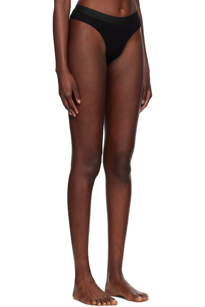 Pack of three stretch Tencel™ lyocell jersey thongs. Moisture-wicking.

· Mid-rise
· Herringbone trim at elasticized waistband
· Jacquard logo at back waistband
· Partially lined

Supplier color: Black