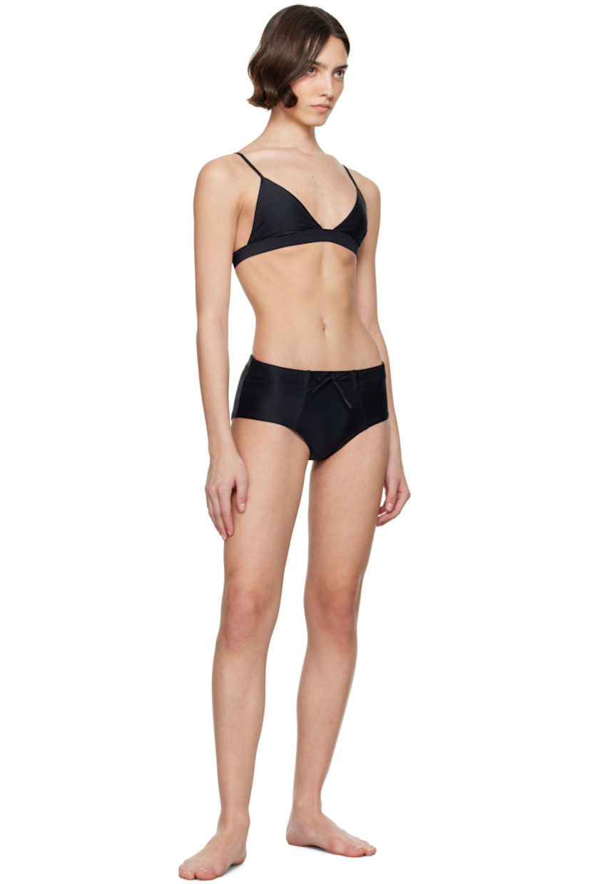 Stretch ECONYL® recycled nylon swim briefs.

· Quick-drying
· Drawstring at elasticized waistband
· Fully lined

Supplier color: Black