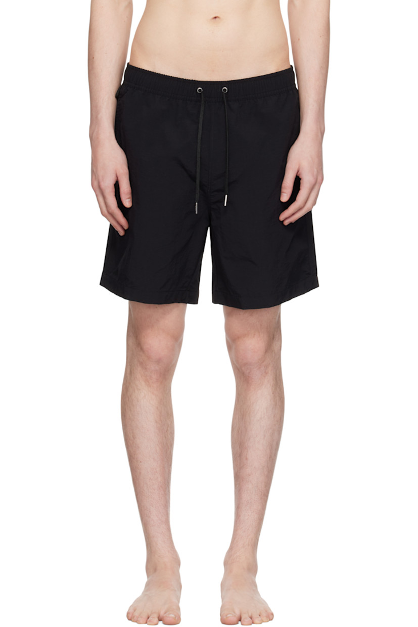 ECONYL® regenerated nylon canvas swim shorts.

· Quick-drying
· Drawstring at elasticized waistband
· Three-pocket styling
· Vented outseams
· Eyelets at back
· Mesh briefs-style lining
· Logo-engraved silver-tone hardware

Supplier color: Black