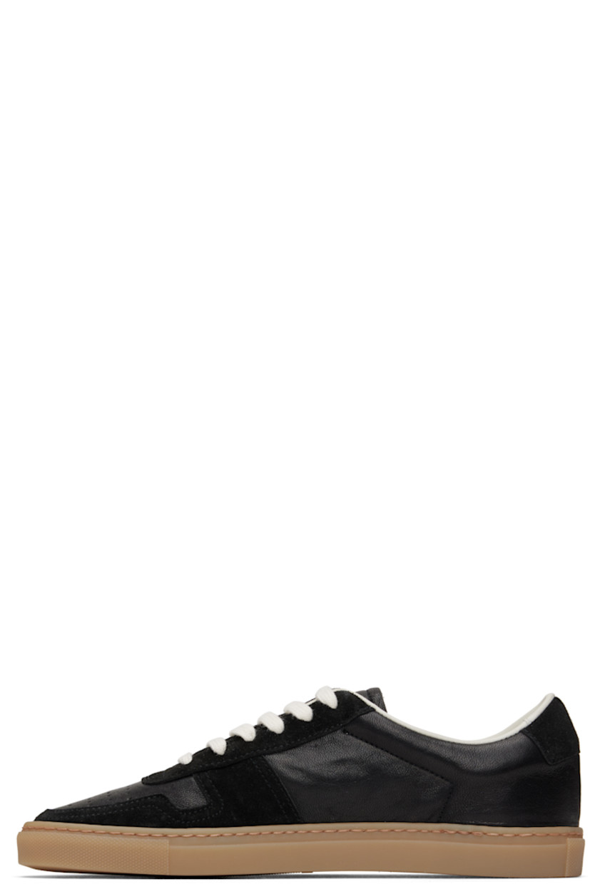 Low-top grained leather and suede sneakers in black.

· Perforations at toe and outer side
· Lace-up closure
· Padded tongue and collar
· Signature series stamp at outer side
· Buffed leather and mesh lining
· Treaded rubber sole

Supplier color: Black