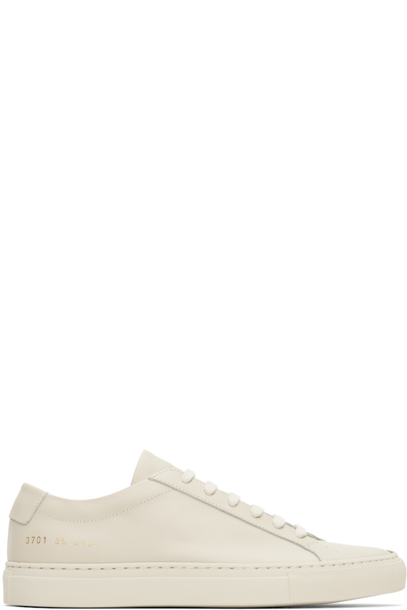 Low-top buffed leather sneakers in beige.

· Lace-up closure
· Padded tongue and collar
· Signature series stamp at outer side
· Buffed leather and mesh lining
· Treaded rubber sole

Supplier color: Cremino