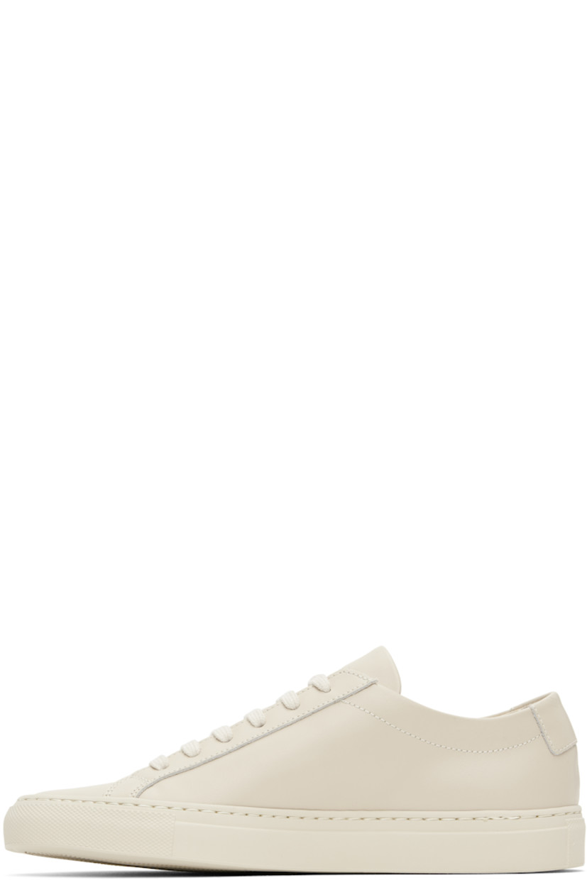 Low-top buffed leather sneakers in beige.

· Lace-up closure
· Padded tongue and collar
· Signature series stamp at outer side
· Buffed leather and mesh lining
· Treaded rubber sole

Supplier color: Cremino