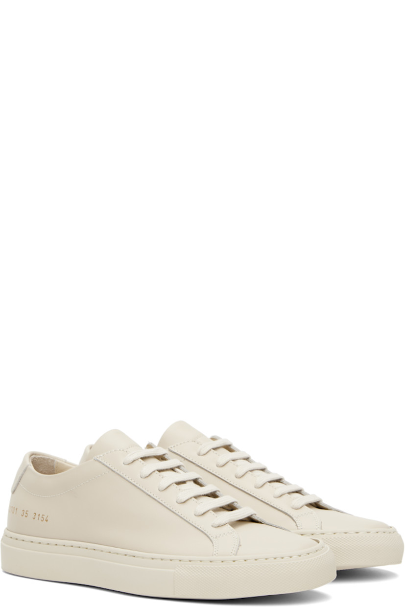 Low-top buffed leather sneakers in beige.

· Lace-up closure
· Padded tongue and collar
· Signature series stamp at outer side
· Buffed leather and mesh lining
· Treaded rubber sole

Supplier color: Cremino