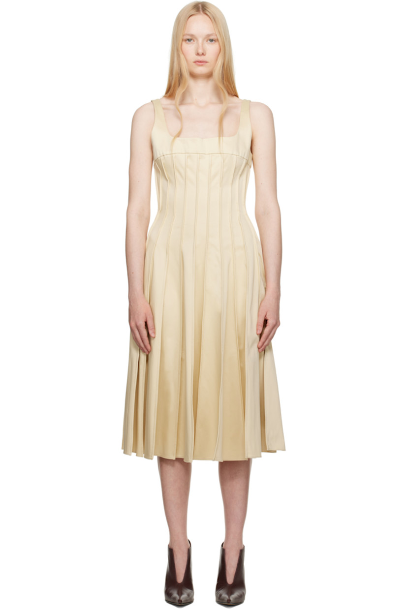 Plain-woven stretch cotton midi dress. Pinched seams throughout.

· Square neck
· Seam pockets
· Fixed shoulder straps
· Concealed zip closure at back
· Unlined

Supplier color: Yellow