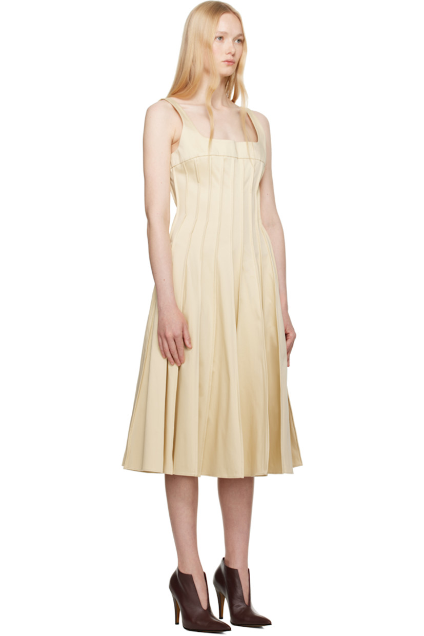 Plain-woven stretch cotton midi dress. Pinched seams throughout.

· Square neck
· Seam pockets
· Fixed shoulder straps
· Concealed zip closure at back
· Unlined

Supplier color: Yellow