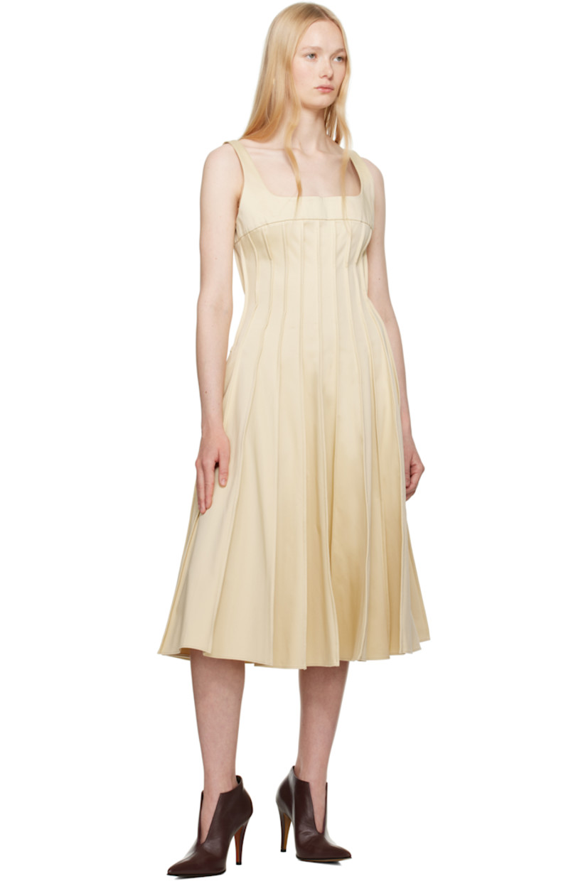 Plain-woven stretch cotton midi dress. Pinched seams throughout.

· Square neck
· Seam pockets
· Fixed shoulder straps
· Concealed zip closure at back
· Unlined

Supplier color: Yellow