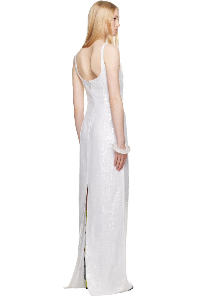 Sequinned plain-woven polyester maxi dress.

· Straight neck
· Darts at bodice
· Fixed shoulder straps
· Concealed zip closure at back
· Central slit at back hem
· Full crêpe lining

Supplier color: White