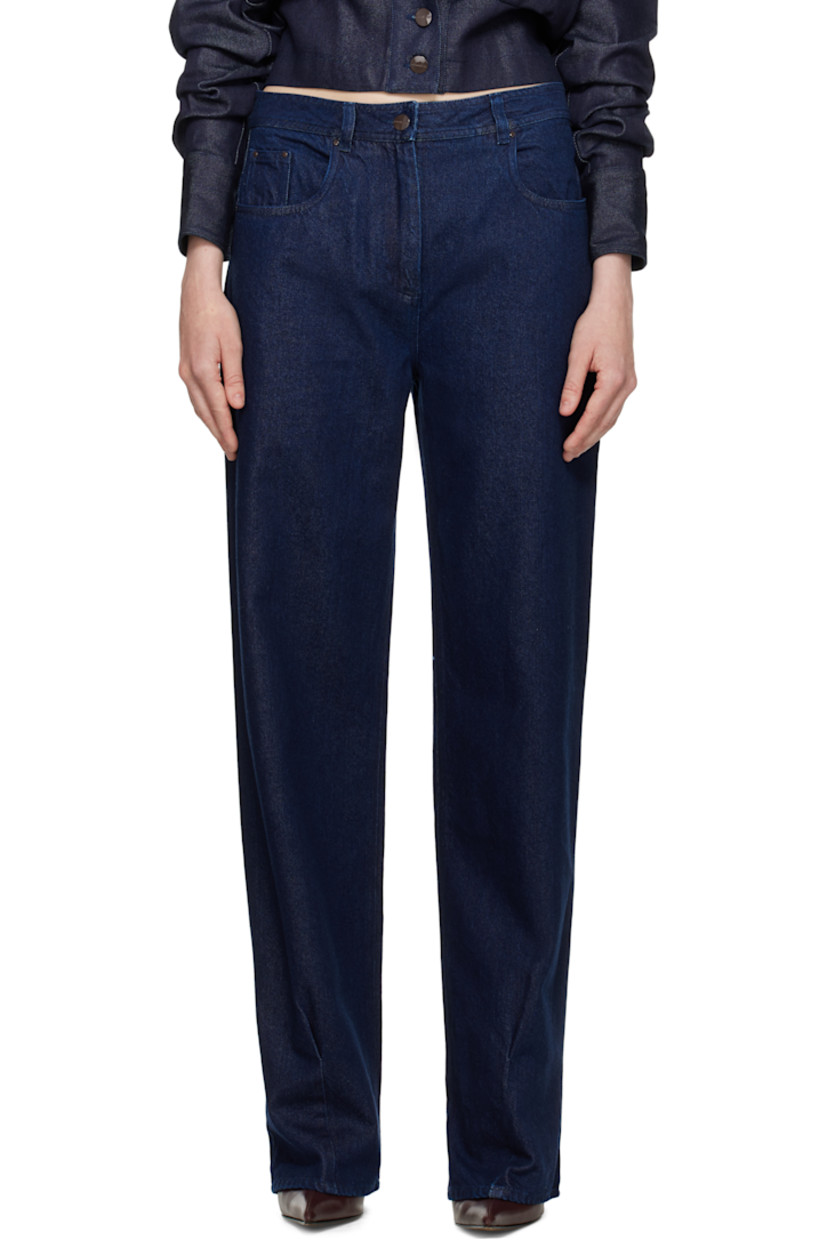 Straight-leg non-stretch cotton- and lyocell-blend denim jeans. 

· Belt loops
· Five-pocket styling
· Zip fly
· Dart at front cuffs
· Leather logo patch at back waistband
· Logo-engraved hardware

Supplier color: Blue