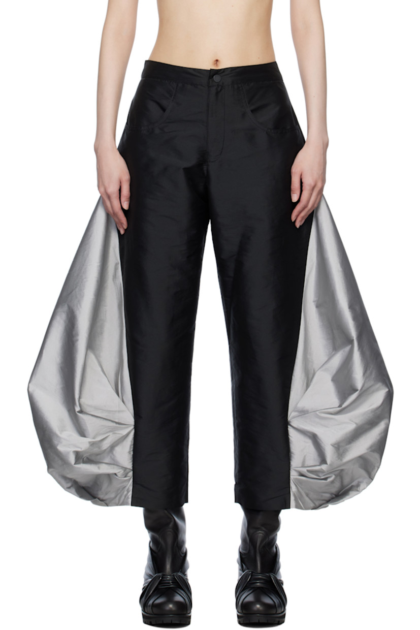 Polyester taffeta trousers.

· Three-pocket styling
· Zip-fly
· Gathered panel at outseams

Supplier color: Black Taffeta & Grey