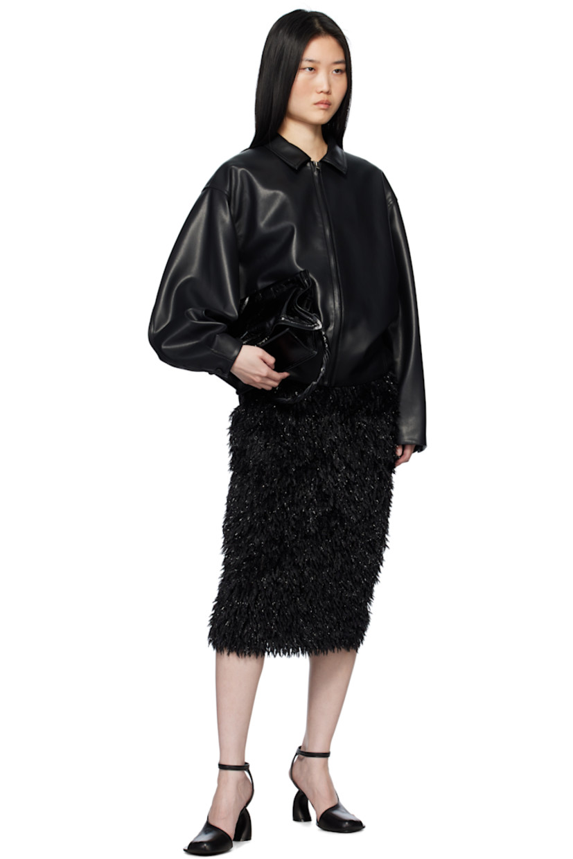 Polyester crepe and stretch wool fleece midi skirt. Metallic thread detailing throughout.

· Two-pocket styling
· Darts at back waistband
· Concealed zip closure at back
· Central vent at back hem
· Full viscose satin lining

Supplier color: Nero