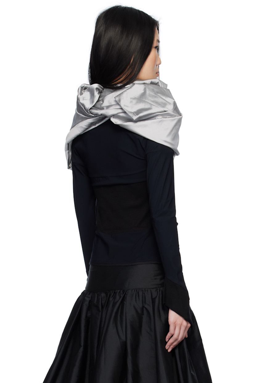 Stretch nylon jersey cardigan. Integrated polyester taffeta gigot sleeve shawl-style overlay with pagoda shoulders.

· Rib-knit trim throughout
· Round neck
· Self-tie fastenings at open front
· Flared cuffs

Supplier color: Black & Grey