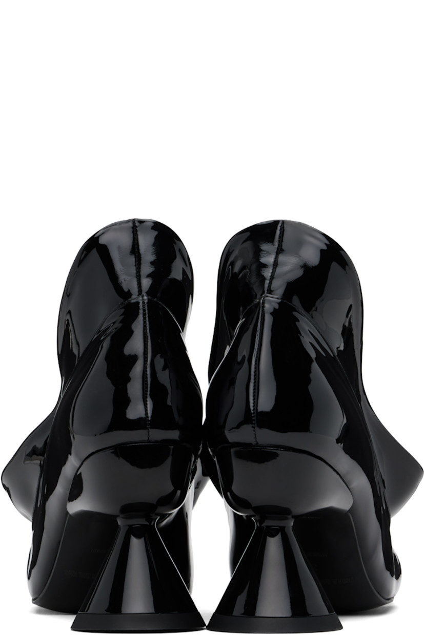 Patent faux-leather heels in black.

· Modified square toe
· Extended collar
· Logo embossed at padded footbed
· Covered spool heel with rubber injection
· Faux-leather sole with rubber injection
· Heel: H3"

Supplier color: Black