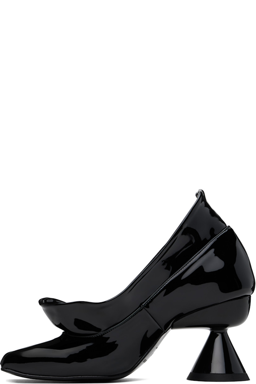 Patent faux-leather heels in black.

· Modified square toe
· Extended collar
· Logo embossed at padded footbed
· Covered spool heel with rubber injection
· Faux-leather sole with rubber injection
· Heel: H3"

Supplier color: Black